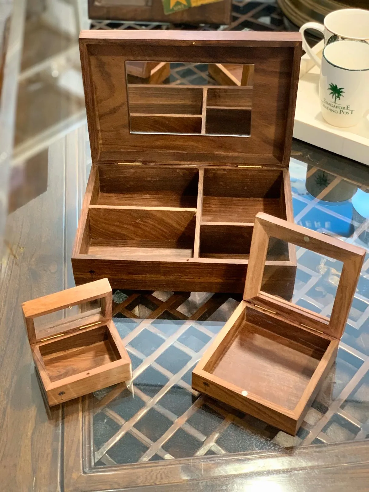 Dark wood gift box with glass lid.